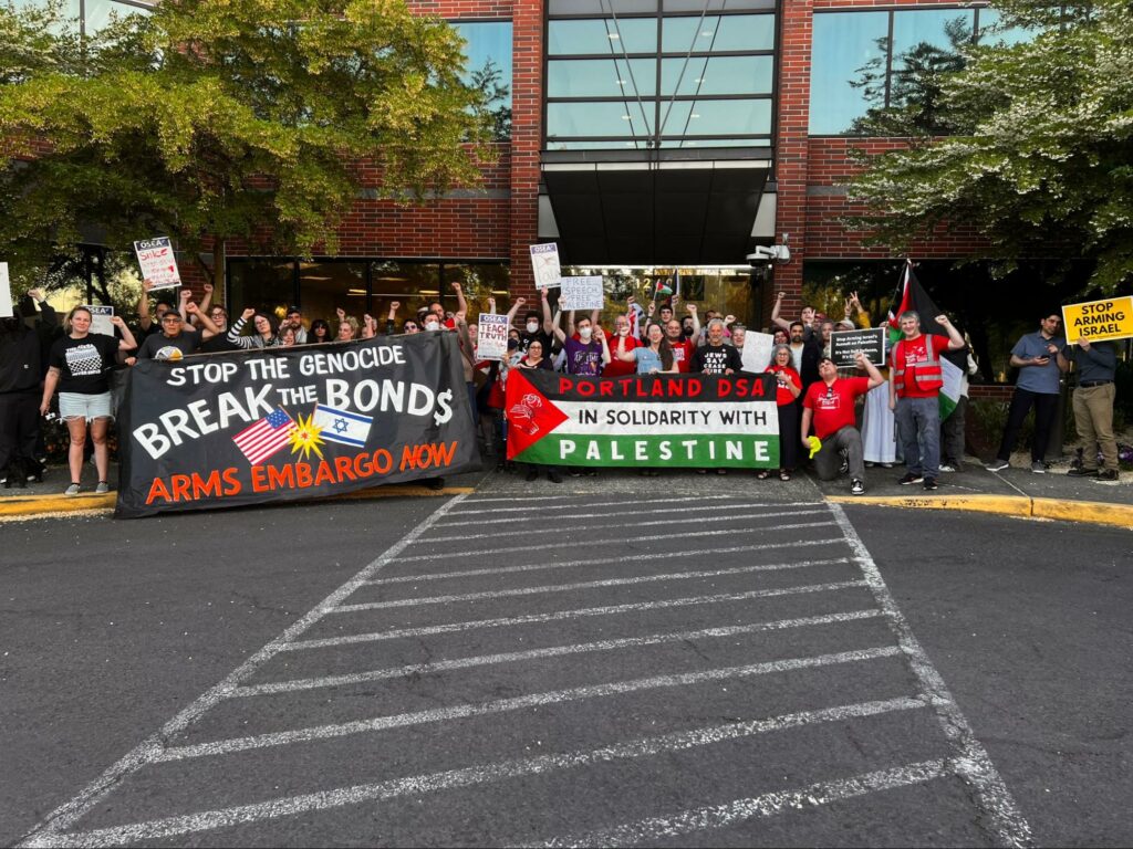 About 50 of the 150 supporters who rallied outside the Beaverton School Board headquarters, holding signs calling for arms embargo and solidarity with Palestine.