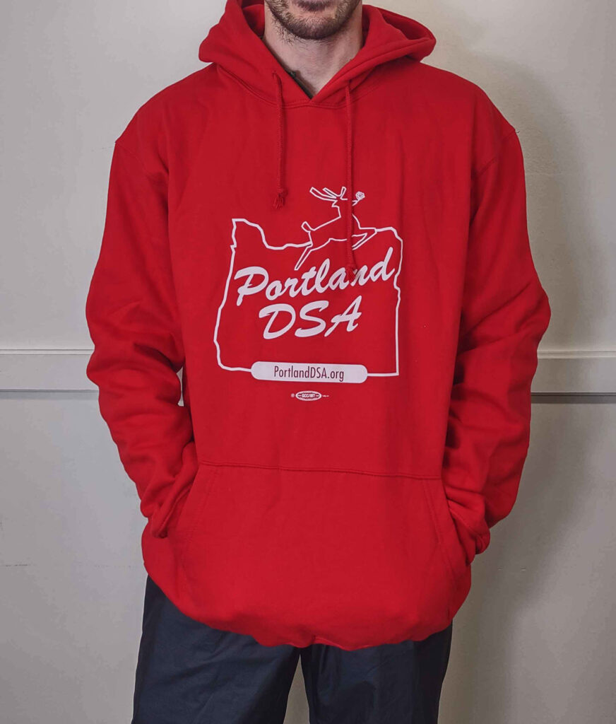 red hoodie with "Portland DSA" inside the White Stag sign
